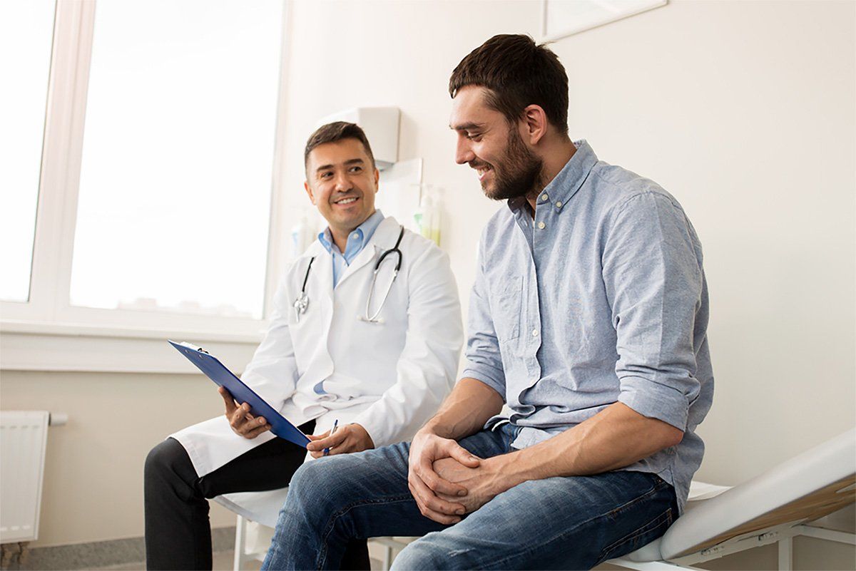 Doctor explains hair transplant to patient