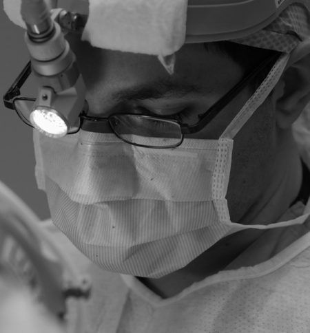 Doctor during hair trasplant procedure