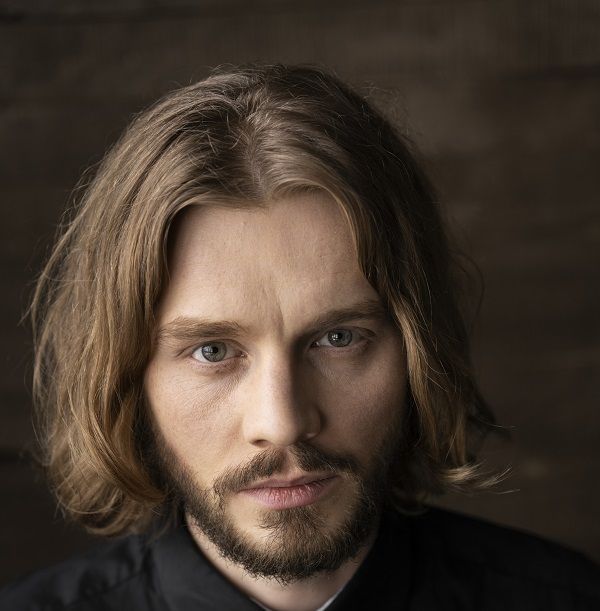 Man with center part haircut