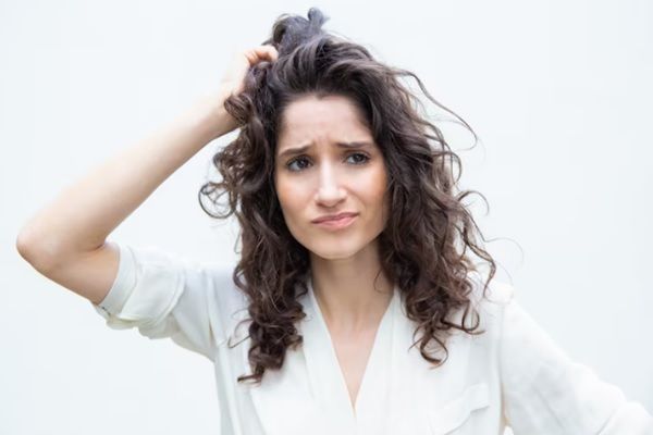 Wie man verbranntes Haar wiederherstellt